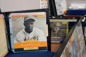 Close up of chef Raymond Nottie's collection of African American heros