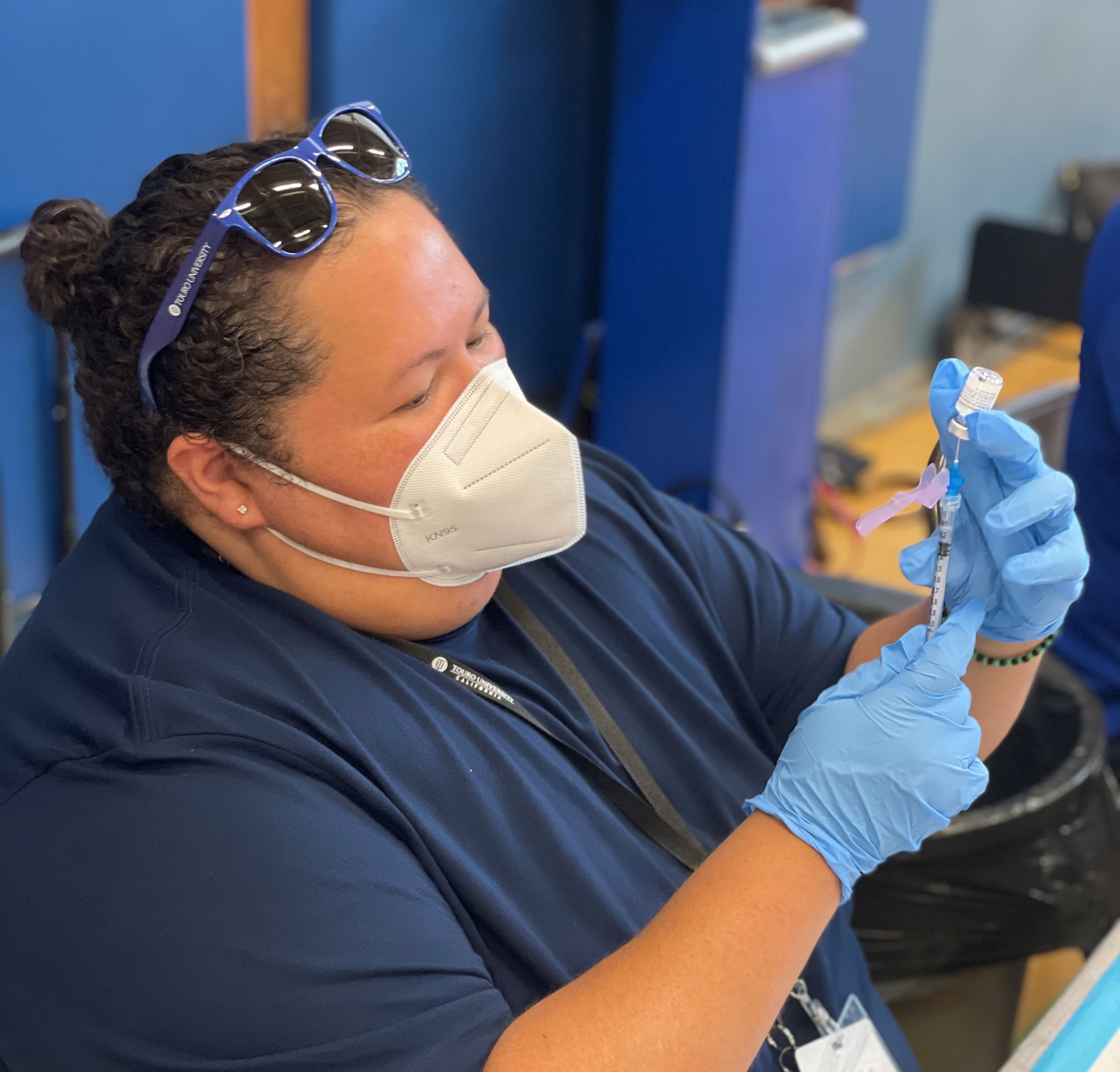 Dr. Fatima Hernandez administers vaccines at a Touro Cares MVP Event.