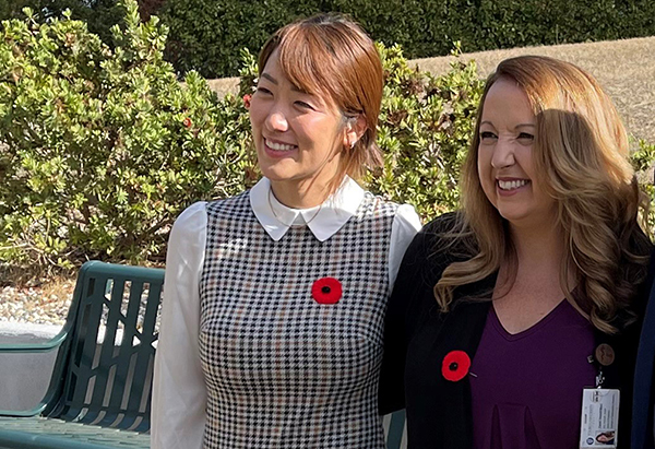 A photo shows Dr. Tami Hendriksz as she poses for a photo with Student Doctor Grace Hwang after the Veterans Day ceremony in The Grove on the Touro University California campus, Friday, Nov. 10, 2023.