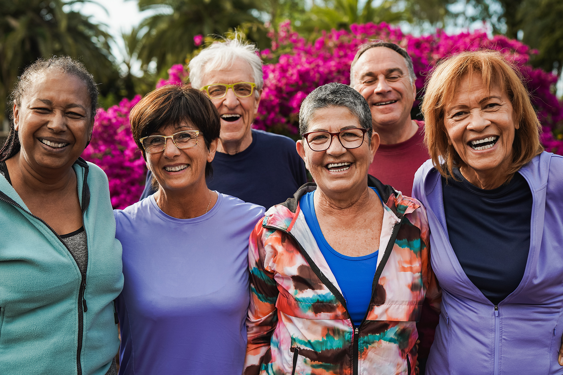 a group of senior citizens in a group smiling