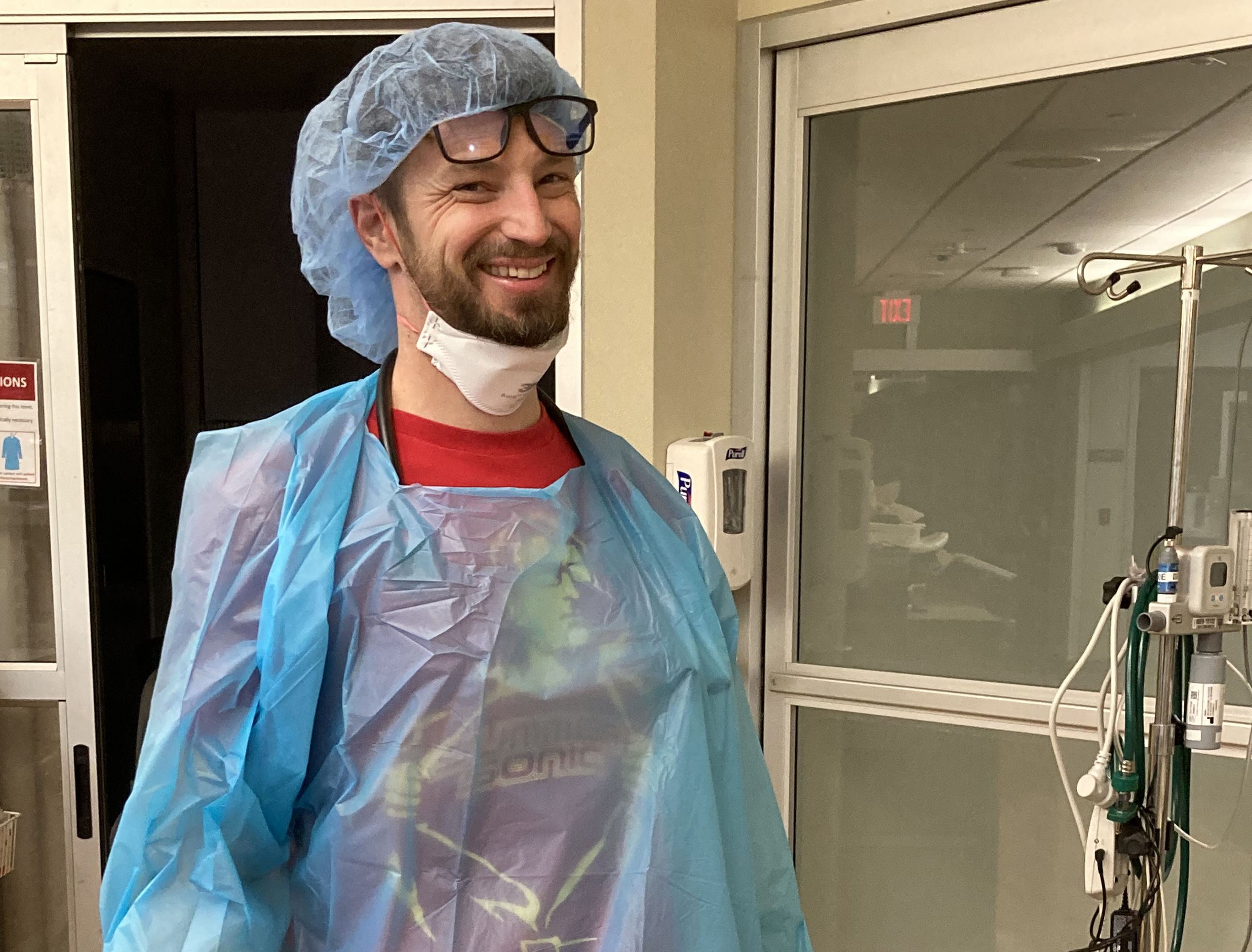 A photo shows Dr. James Wilson as he stops for a photo while geared up for service in the ICU during the Covid-19 pandemic.