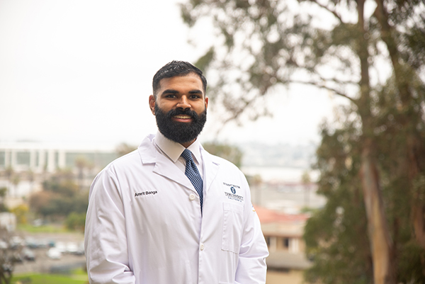 A photo shows Student-doctor Amrit Banga, a graduate of the MSMHS program at Touro University California and a 2026 DO candidate.