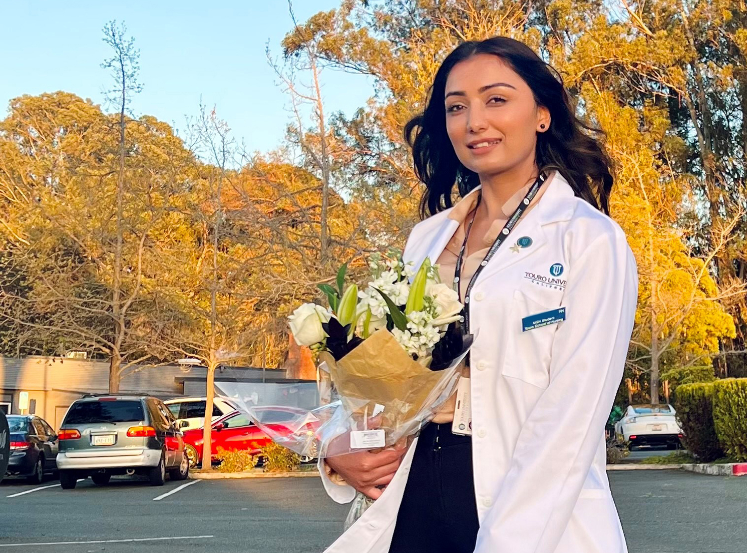 A photo shows Swosthani Paudyal (MSN Class of 2023) after her School of Nursing White Coat ceremony in 2023 at Touro University California. Paudyal gave a brief keynote talk at the SON White Coat ceremony on campus, Thursday, March 7, 2024.