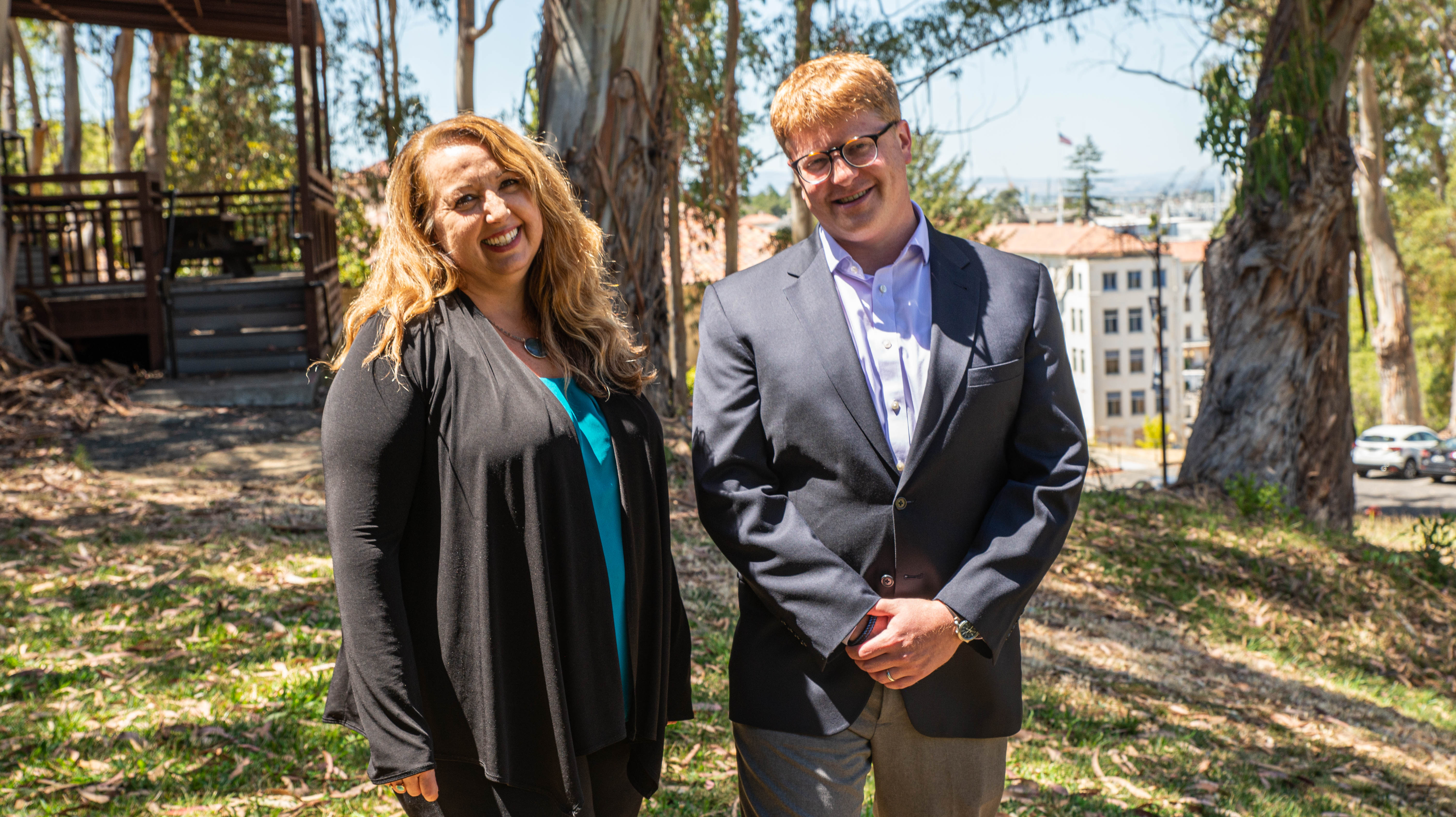 Dr. Tami Hendriksz the Interim Chief Academic Officer and Dean of the College of Osteopathic Medicine standing next to Newman Hoffman the Interim CEO and Vice President