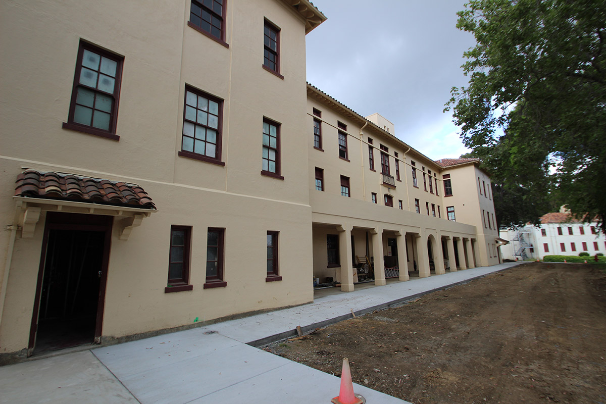 The photo shows the exterior of Truett Hall as work progresses this spring at Touro University California.