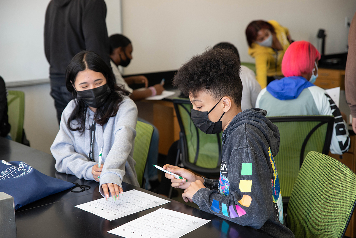 High school students take part in an exercise meant to improve communication and teamwork skills during SCOE Leadership Institute.