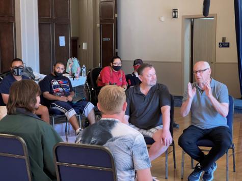 Joey Travolta gives feedback during a film camp.