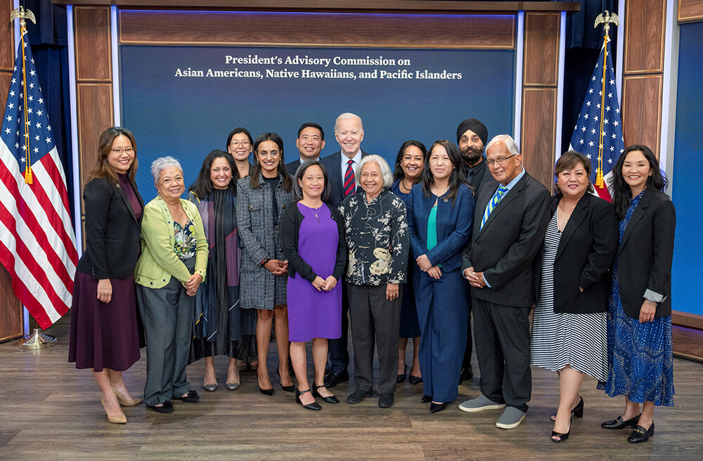 Dr. Kamal Kalsi stands with other physicians and President Biden.